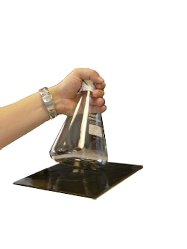 Sticky pad with hand holding erlenmeyer (1)